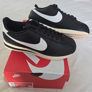 NIB Nike Cortez 23 Premium Sneakers Blk/ White
Size W 9.5 M 8